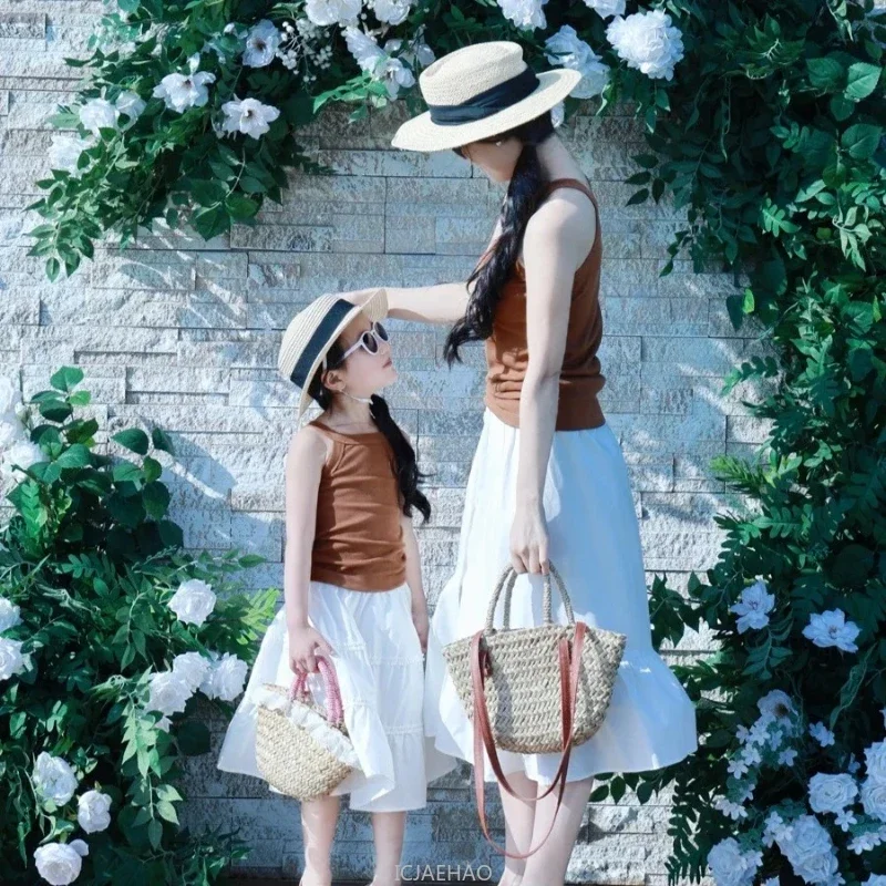 

2025 Mom Baby Girls Vest White Skirts Two Piece SetsMommy and Me Clothes Outfits Summe Mother and Daughter Matching Clothing