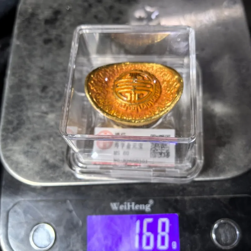 ingot, gilded, Qing Dynasty, Qianlong reign, featuring the symbols of fortune, longevity, happiness, and wealth; a gold ing