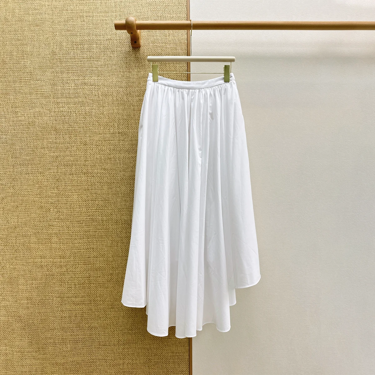 2026 high-quality new women's clothing simple half length skirt with irregular drape