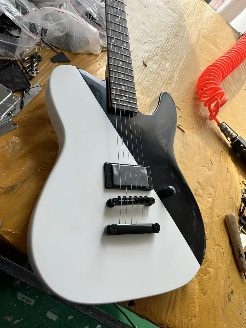 

Custom 6-string black and white electric guitar，Rosewood fingerboard，Fixed bridge，Black hardware，Solid wood quality, free delive