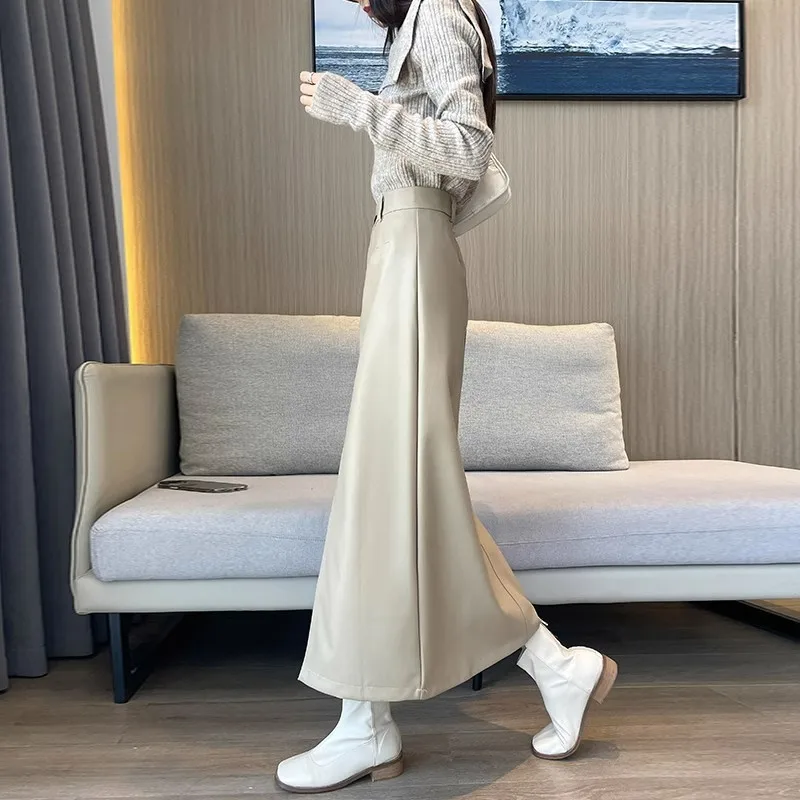 ブラックPUレザースカート レディース 秋冬 2025 新作 ミディアム丈 ハイウエスト スリミング スリット入り ヒップ ワンステップスカート