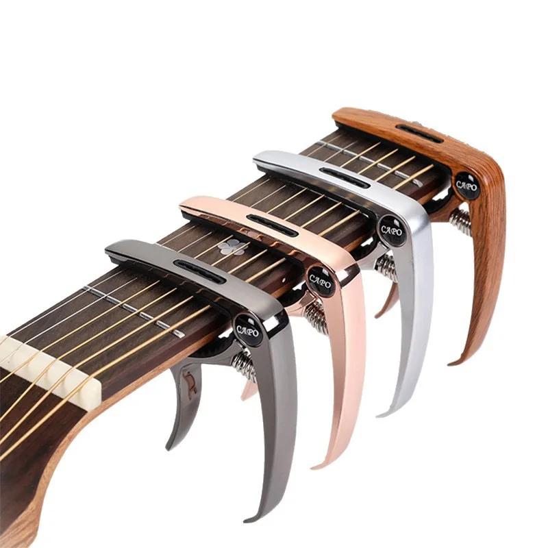 Capo de guitarra de Metal, abrazadera afinadora de guitarra de aleación de aluminio, capó de gatillo de llave profesional para instrumentos musicales eléctricos acústicos, 1 ud.