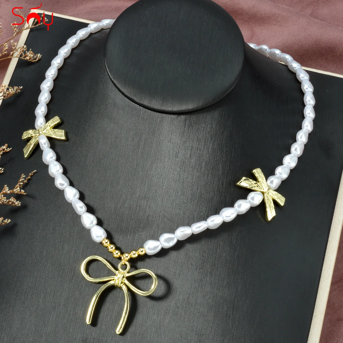 

Bowknot White Ball Pendant Necklace for Women Classic Hollow Bead Drop Clavicle chain Choker Birthday Party Girl Jewelry Gift