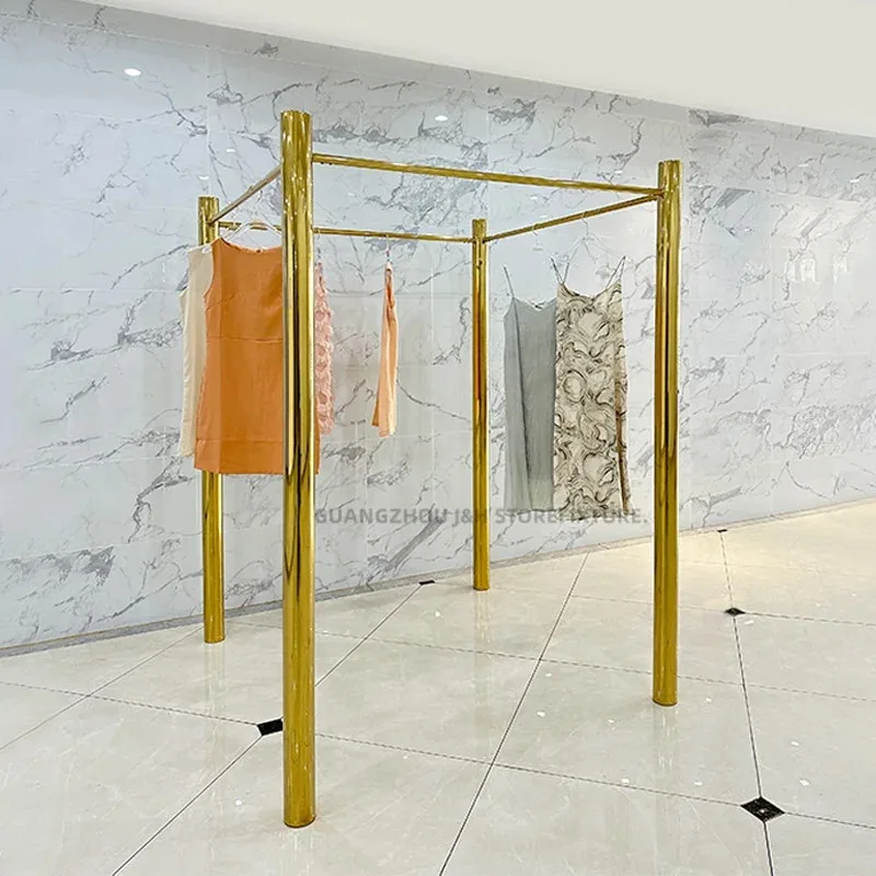 custom.Unique Design Retail Clothing Shop Display Rack Stainless Steel Garment Stand Shiny Gold Clothing Store Display Rack