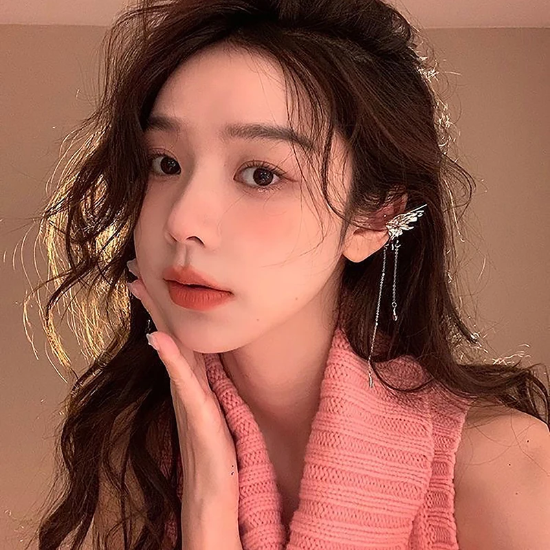 Boucles d'oreilles ailes d'ange en métal liquide, 1 paire, pompon papillon, manchette d'oreille, Non Piercing, Design Punk tendance, longue pince d'oreille pour femme, bijoux