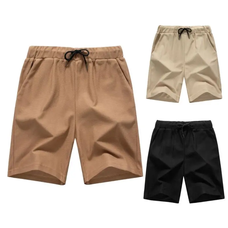 Summer New Men's Solid Color Elastic Tether Beach Pants Casual Sports Five-point Pants