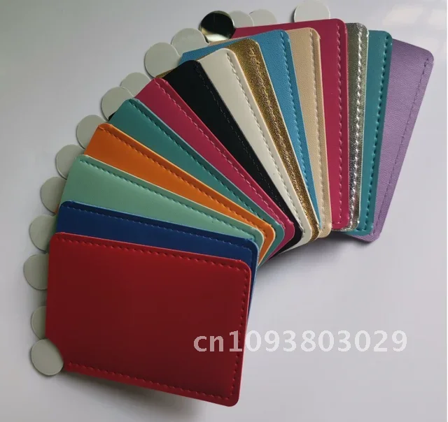 Commercio all'ingrosso 50 pz/lotto portatile trucco carta stile tasca cosmetica PU specchio copertura in pelle infrangibile specchio mini acciaio inossidabile