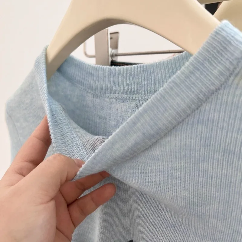 T-shirt da donna a maniche lunghe o-collo lavorato a maglia top sottili stampati Kawaii dimagranti moda coreana High Street Leisure All-match autunno