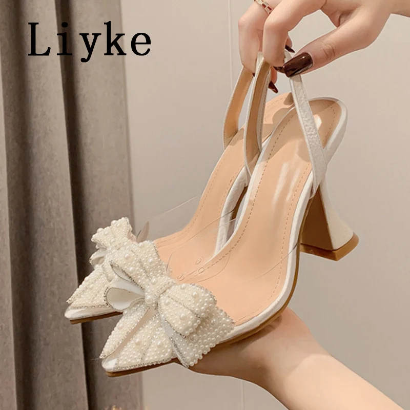 Liyke Summer Fashion Party Dress Slingback Shoes Pearl Bowknot Women Pumps Sexy Pointed Toe White High Heels Transparent Sandals