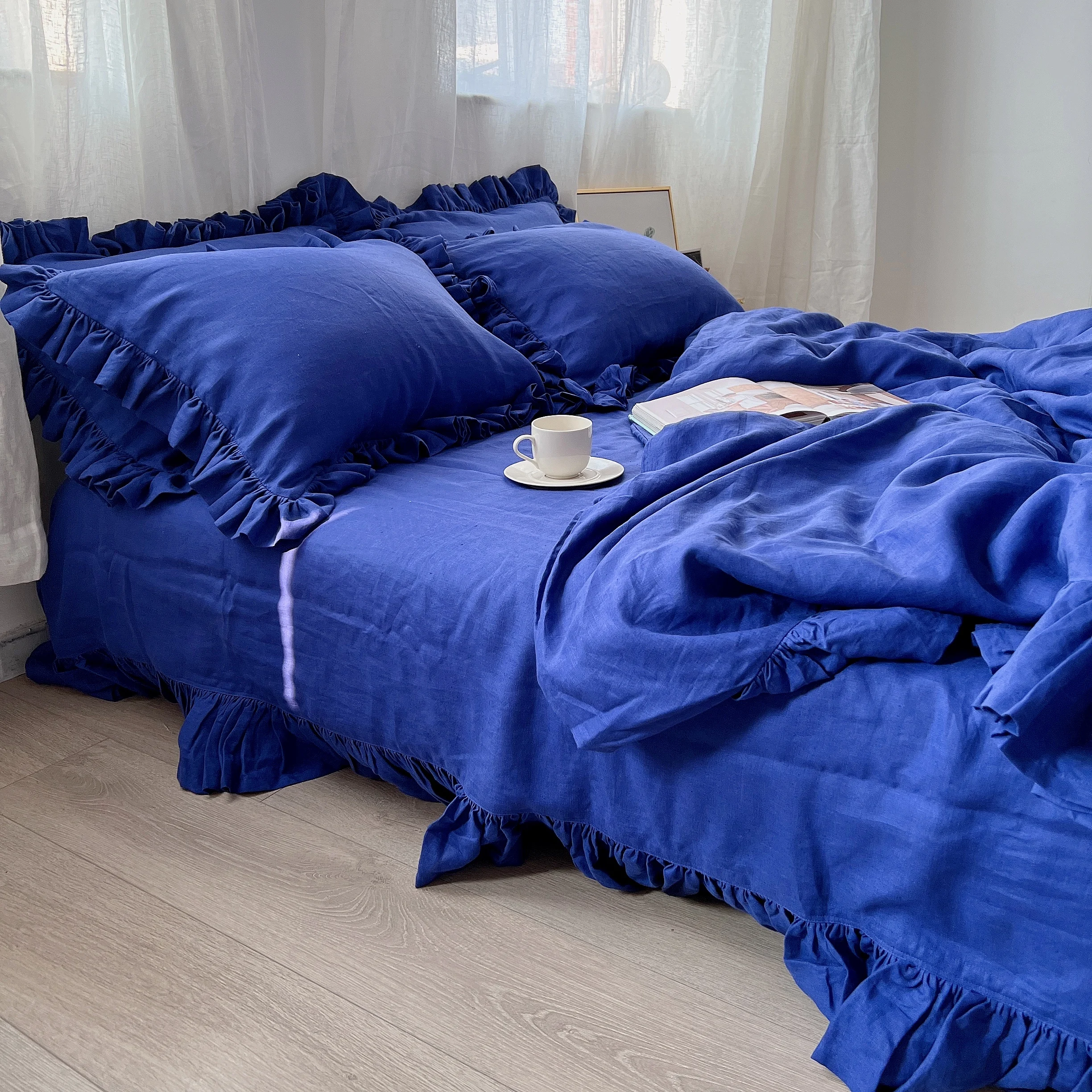 Klein Blue ruffled Four Piece Bedding Set