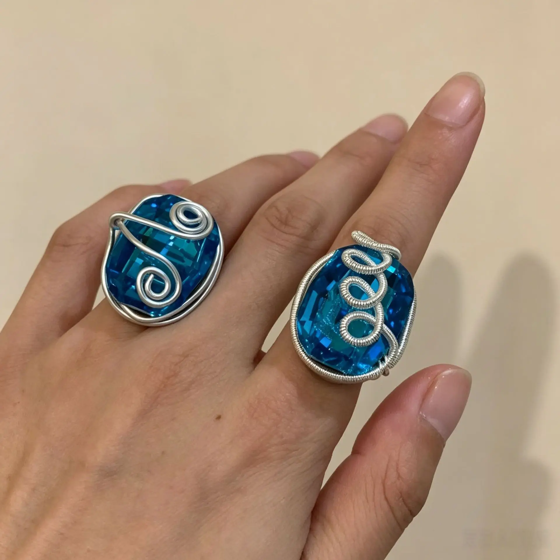 Hand-wound blue crystal ring