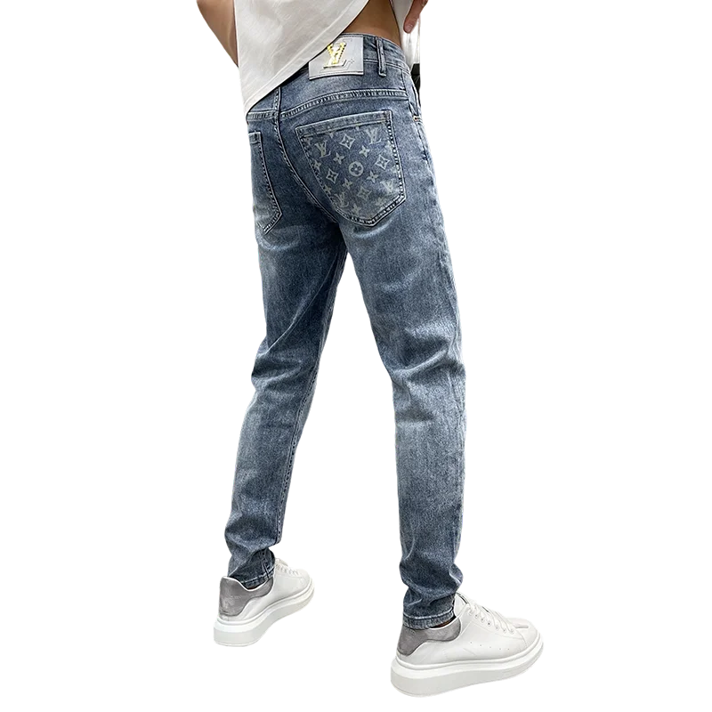 High-end light luxury printing men\'s jeans loose straight pants spring and summer models casual versatile light blue men\'s pants