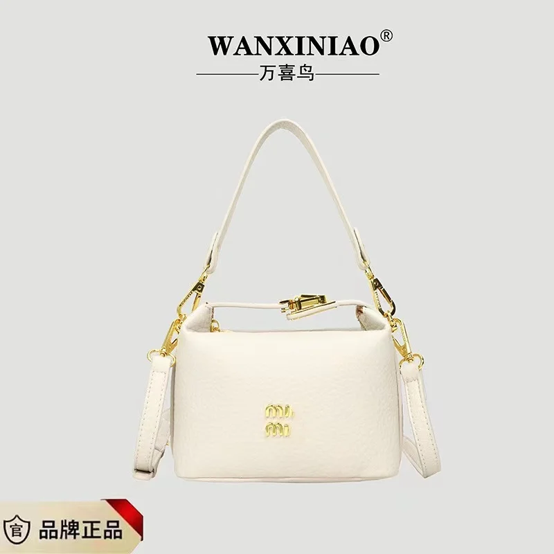 High end soft leather bag for spring and summer 2024, light luxury handbag, magnetic buckle small square bag, niche simple shoul