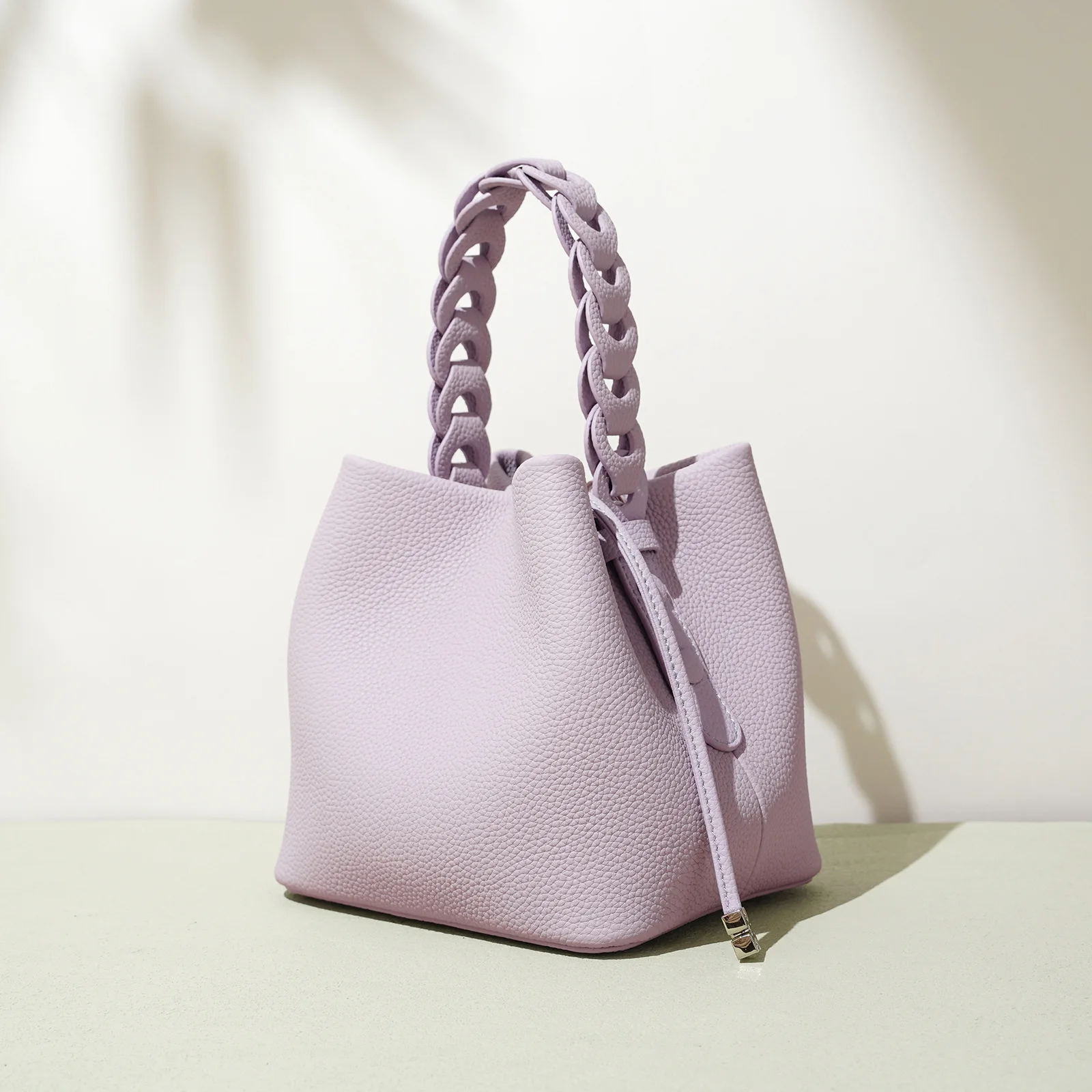 

New cowhide bucket bag, 2025 spring textured leather crossbody bag, versatile single shoulder elegant handbag for commuting