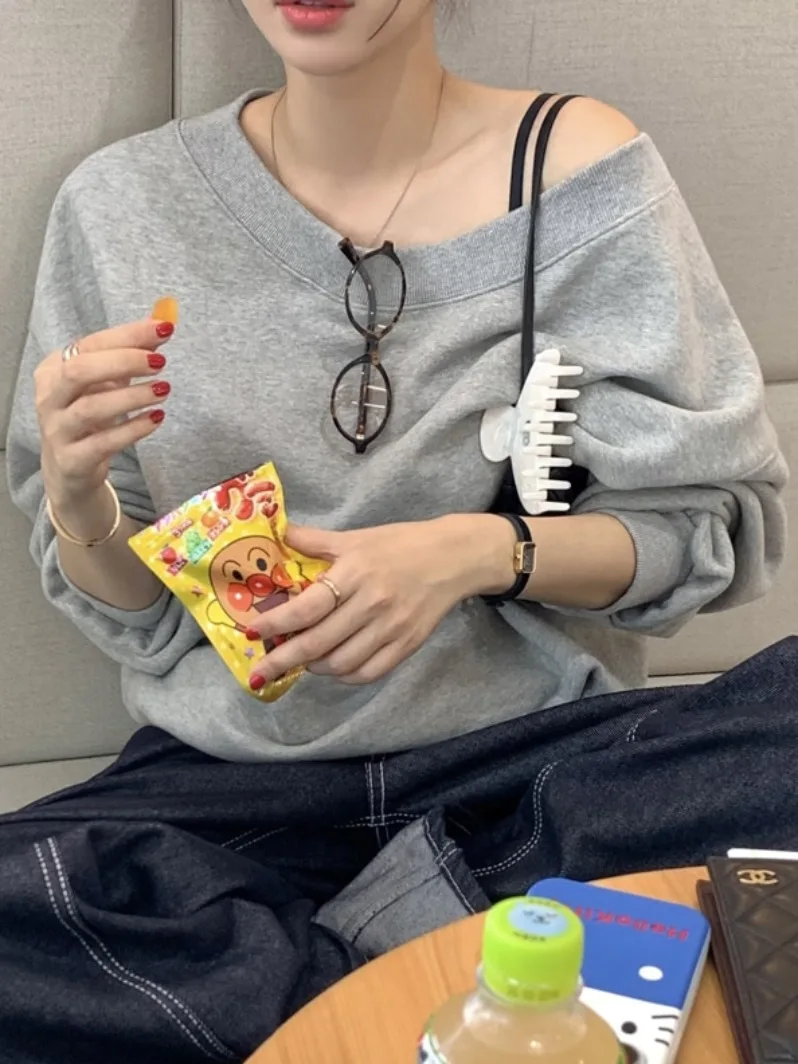 Haut à capuche long et ample pour femme, style décontracté et polyvalent, idéal pour le printemps, parfait pour les trajets quotidiens...