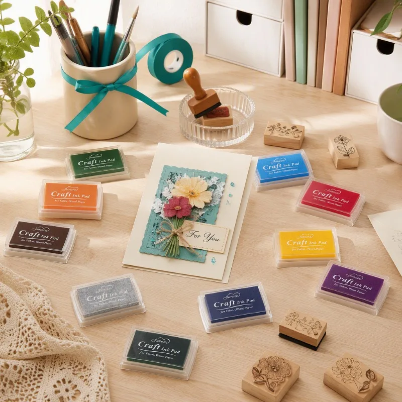 14-color DIY multifunctional craft ink pad set, perfect for DIY craft lovers, journal enthusiasts, kids' creative painting, and office stamp users. Great for making greeting cards, fabric crafts, and wooden crafts.