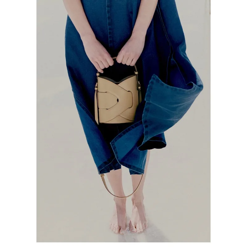 

New French Designer Polen Woven Bag Niche Multi Head Cowhide Antique Single Shoulder Twisted Hand-held New Bucket Armpit Bag Y2K