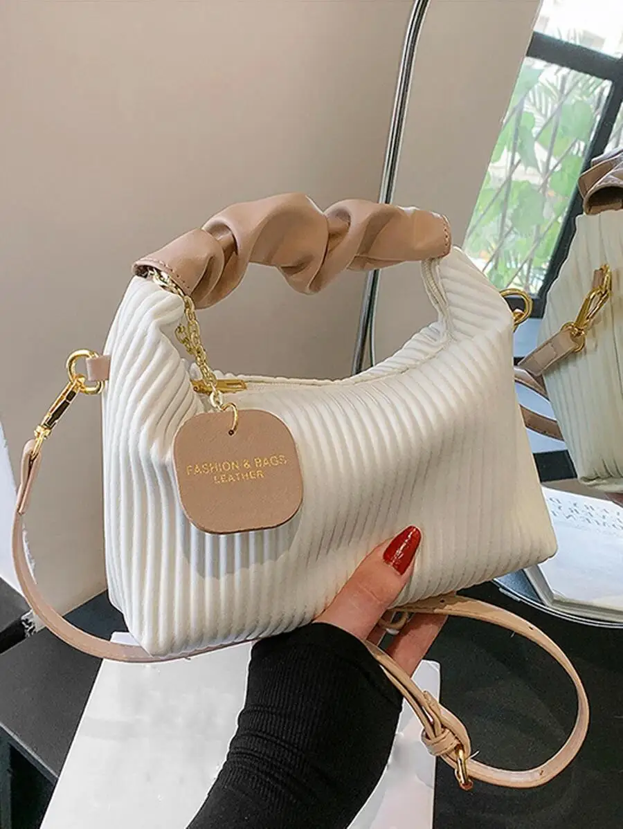 

Кремовая плиссированная сумка-кроссбоди из искусственной кожи с верхней ручкой и витым ремнем