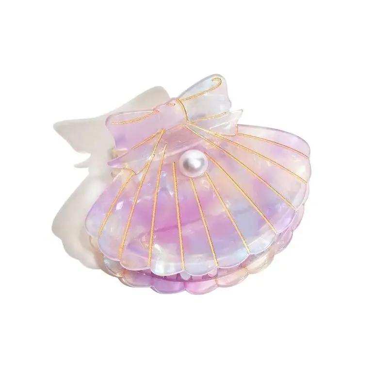 

Medium Scallop Shell with Bow & Pearl Hair Claw Clip