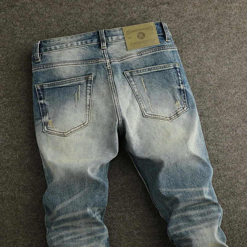 Jeans da uomo firmati di moda Jeans strappati Slim Fit elasticizzati blu lavati retrò di alta qualità da uomo pantaloni dritti Vintage in Denim Hombre