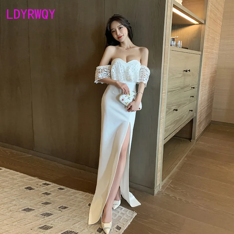 The new low-cut sexy strapless long dress in 2022 wraps the chest with a slit and drags the floor