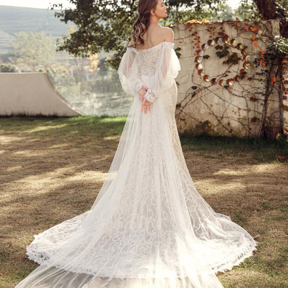 Abiti da ballo Tulle Applique Scoop senza maniche cappella treno Sheer girocollo Appliques di pizzo in rilievo Vestios De Novia abiti da sposa