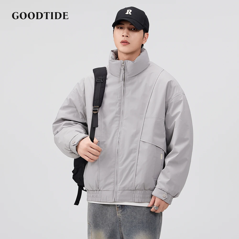 سترة منفوخة بسحّاب غير رسمية للرجال موضة شتاء 2025 بياقة واقفة جديدة تصميم متعدد الجيوب فضفاض مناسب للرجال سترة دافئة للأسفل