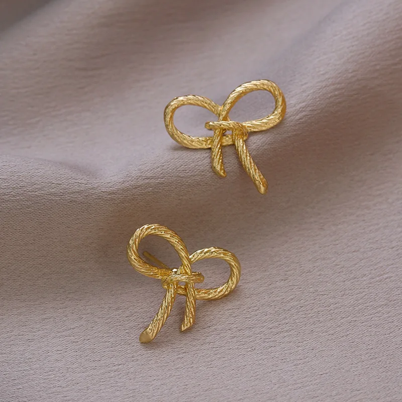Cute Hollow Bowknot Stud Earrings Golden Color Metal Small Earrings for Women Simple Jewelry
