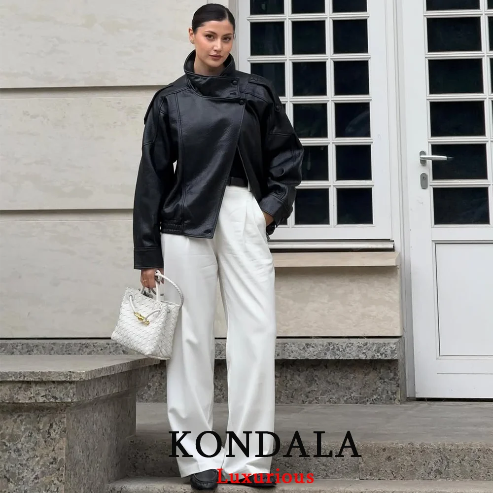KONDALA سترات جلدية سوداء أنيقة غير رسمية للنساء بأكمام طويلة وأزرار معاطف مرنة كبيرة الحجم موضة خريف 2025 معاطف ملابس الشارع الشهير