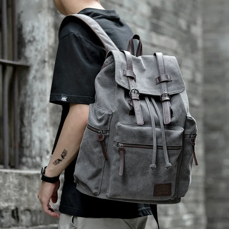 Men's canvas backpack, simple design, large capacity, suitable travel and carrying a laptop, popular style, in stock now