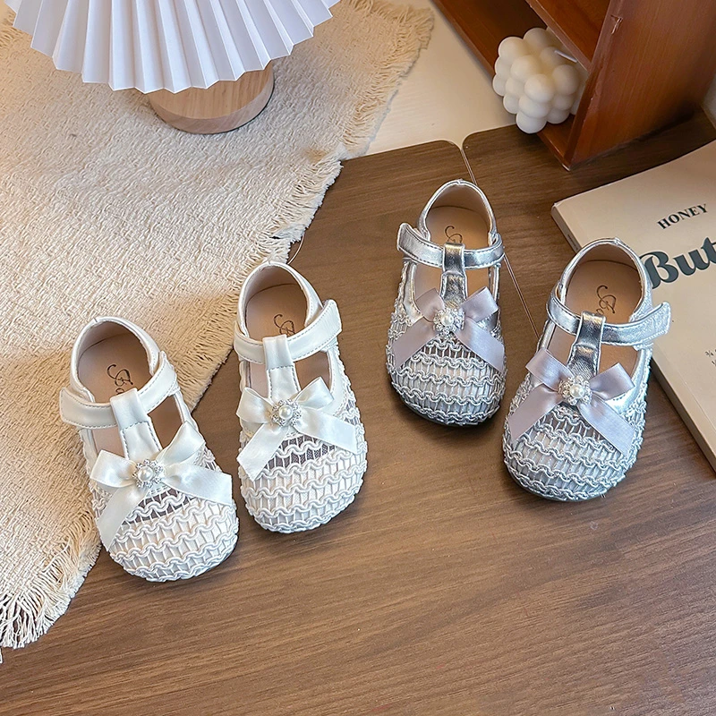

Girls Sandals T-strap Sweet Ribbon Bows Kids Princess Shoes Korean Style Versatile 2026 Summer New Children Casual Flat Shoes