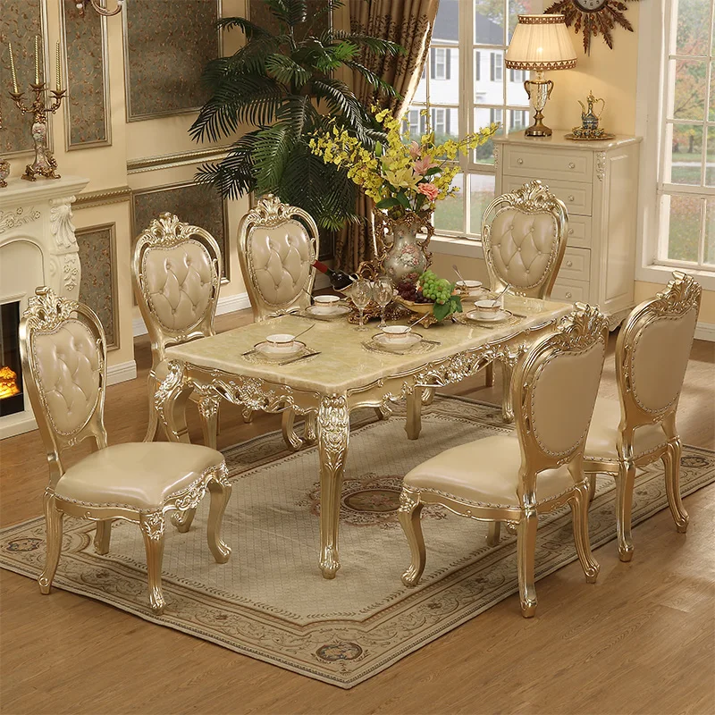 

European champagne gold dining table and chairs solid wood carving flower 1.6 meters table, all solid wood carving marble long d