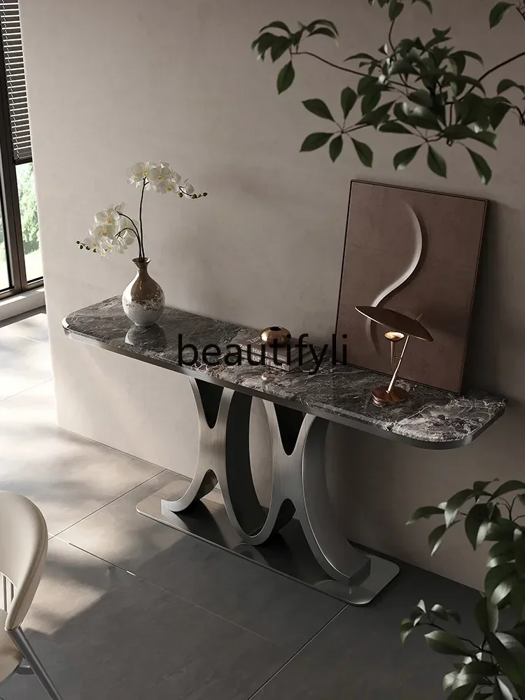 

ls 27The entrance door is facing the designer entrance table, light luxury modern simple high-end marble strip case