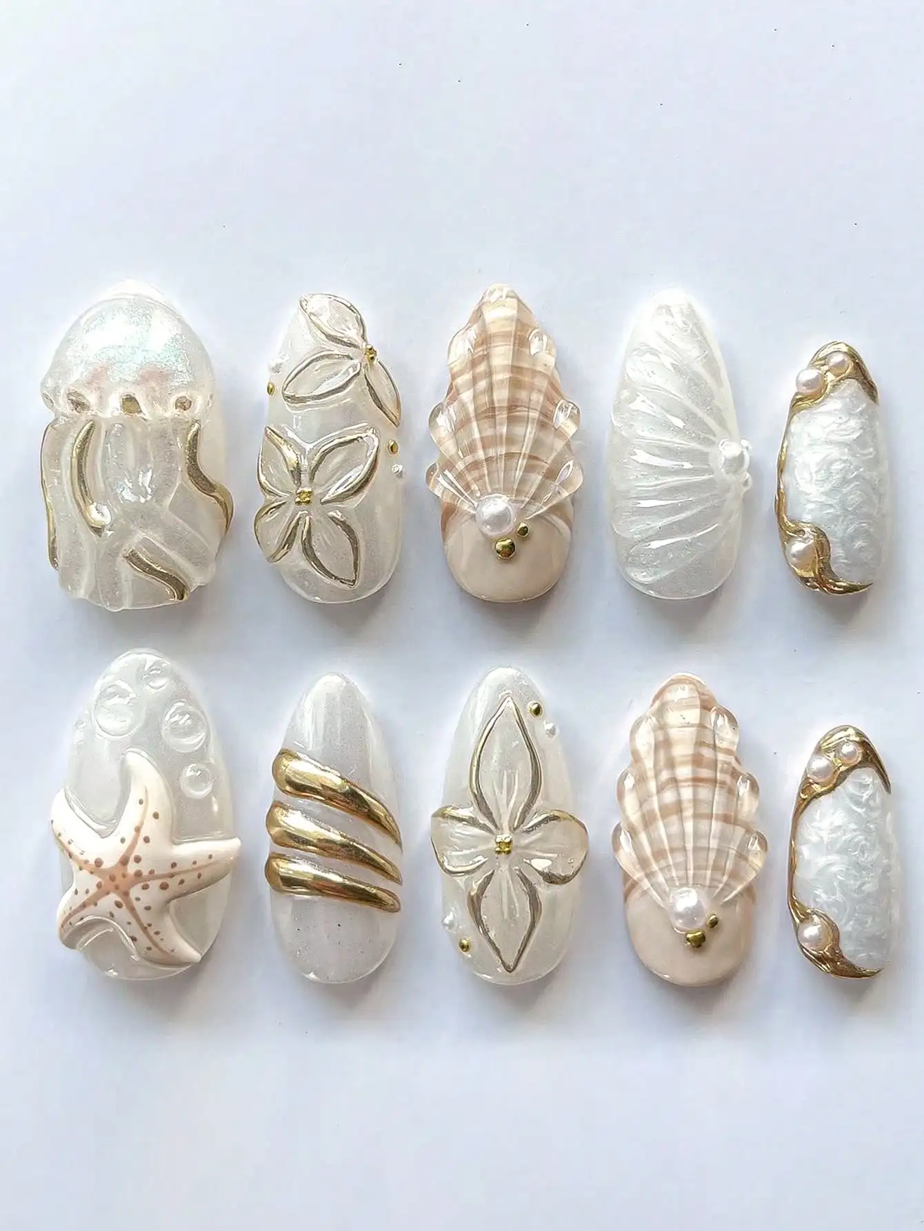 

10Pcs Handmade Almond Nail Tips, Gradient Brown Floral, Waterdrop, Seashell & Gold Foil. Reusable Kit with Jelly File & Buffer. Brightening Press On Nails Supplies.