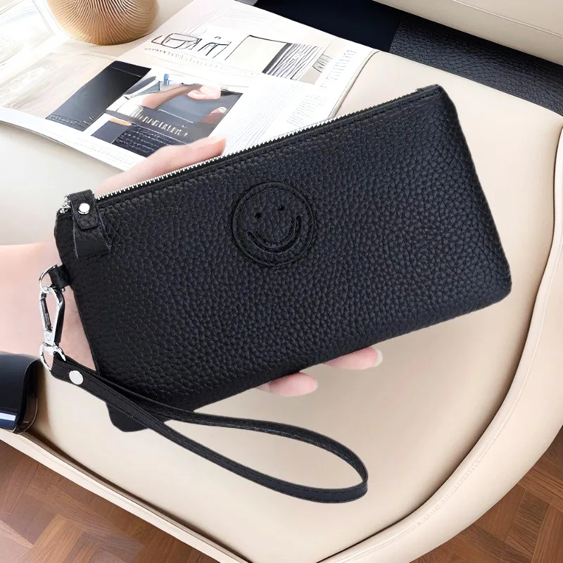 2025年新作 レディースクラッチバッグ 本革 牛革 コインケース カードホルダー ファッションデザイナー 笑顔の顔付き スマホ財布 パーティーバッグ