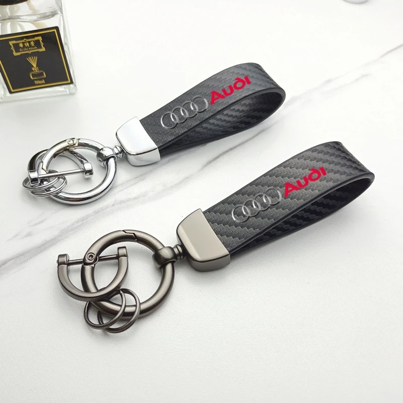 

Car Emblems Keychain Leather Carbon Fiber Keyring Anti-lost Pendant for Audi Q2 Q3 Q3 Q4 Q5 Q6 Q7 Q8 S6 SQ2 TTS Auto Accessories