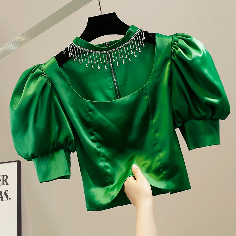 

Ele Satin Bubble Sve ort Top Sexy Clavicle Bared Chain Tassel Faionable Korean Sle round Ne Pullover irt