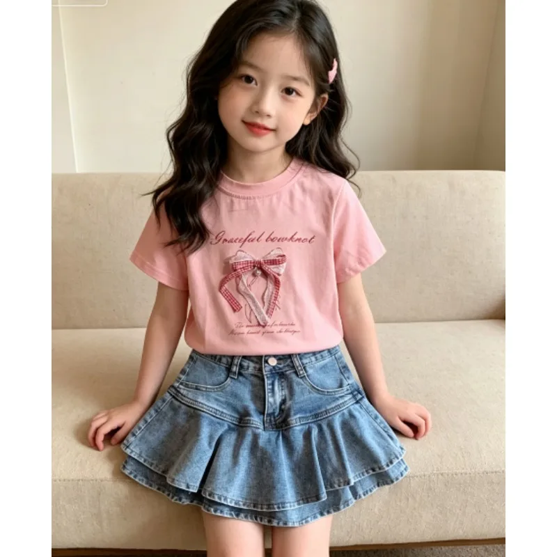 2026 new girls' set Korean three-dimensional bow short sleeved T-shirt summer princess cotton top short skirt