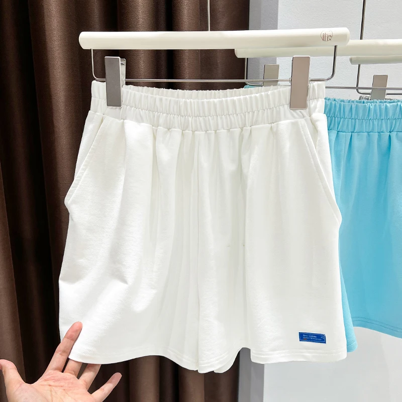 تي شيرت نسائي بكتف واحد على الطراز الفرنسي بأكمام قصيرة صيفي متوسط الأكمام محبوك من الأسفل نصف كم أحمر بكتف واحد عالي