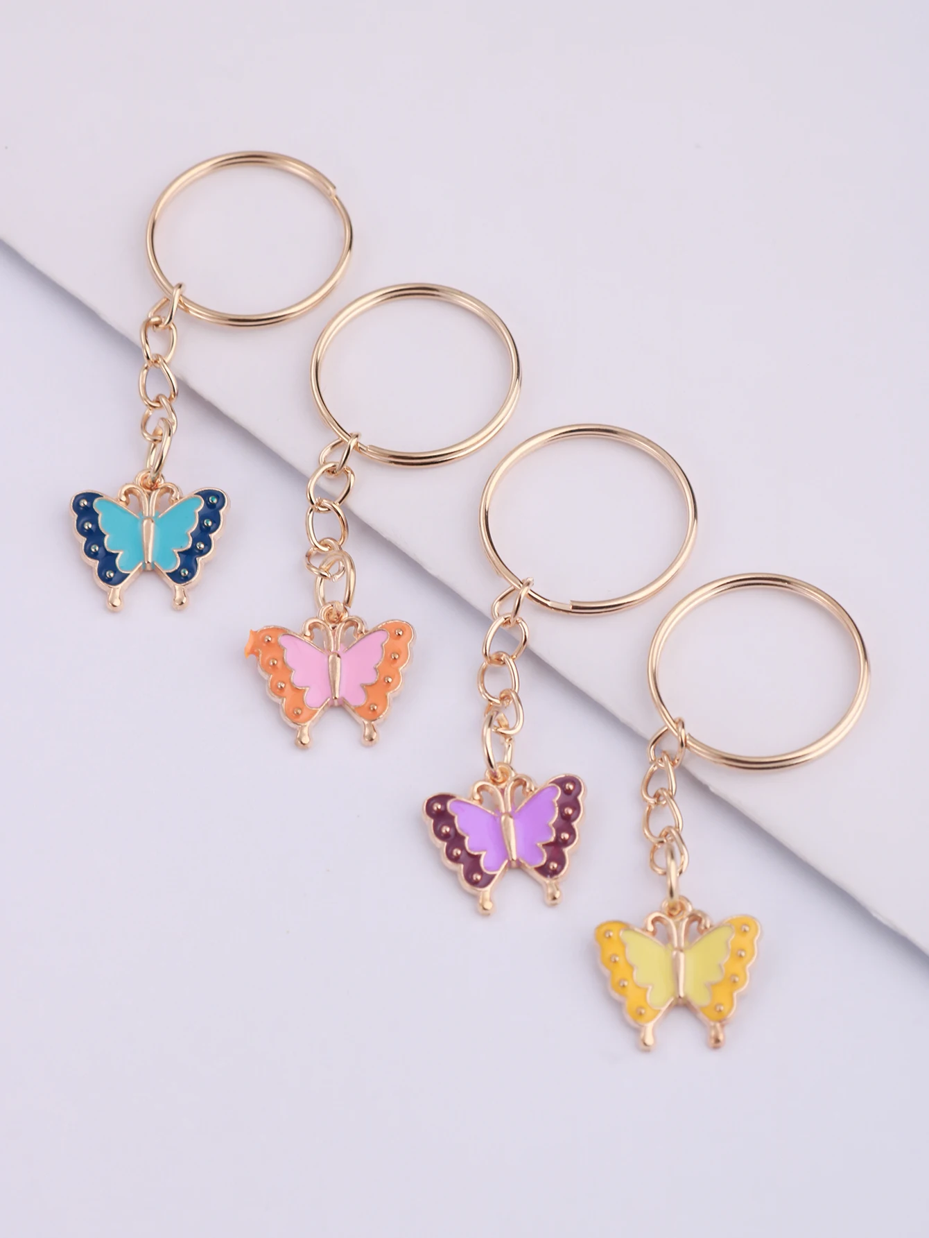 Porte-clés en métal papillon en alliage mignon, porte-clés étoile, décoration de portefeuille, sac à dos, pendentif breloques, cadeau de fête d'anniversaire, 8 pièces