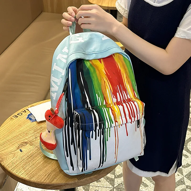 High aesthetic rainbow graffiti backpack for middle and high school students lightweight and large capacity backpack for leisure
