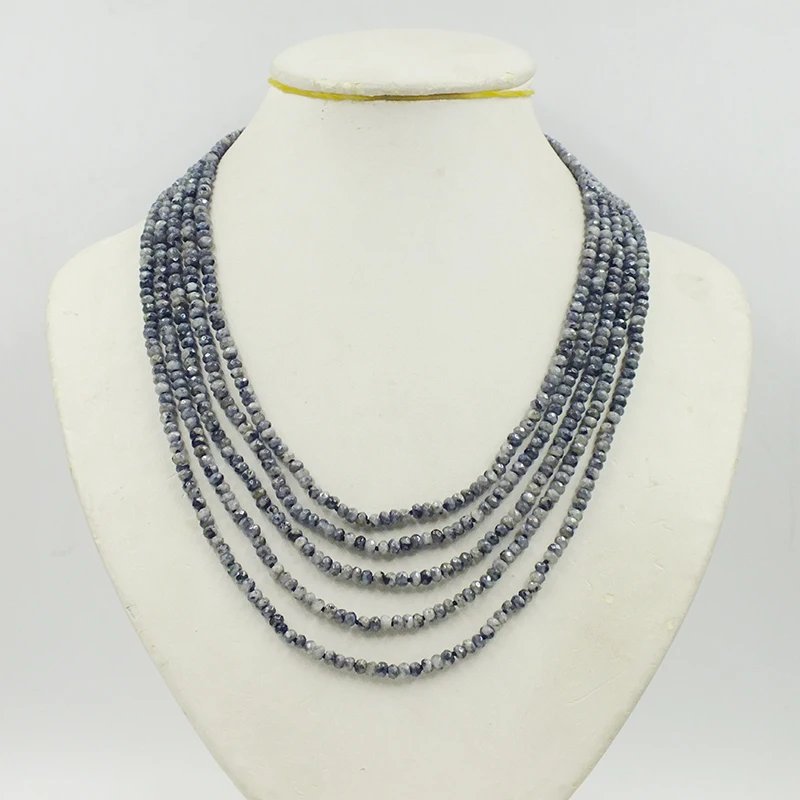 5 rows. 2X4MM natural black/white. Semi precious stones. Necklace 18-23