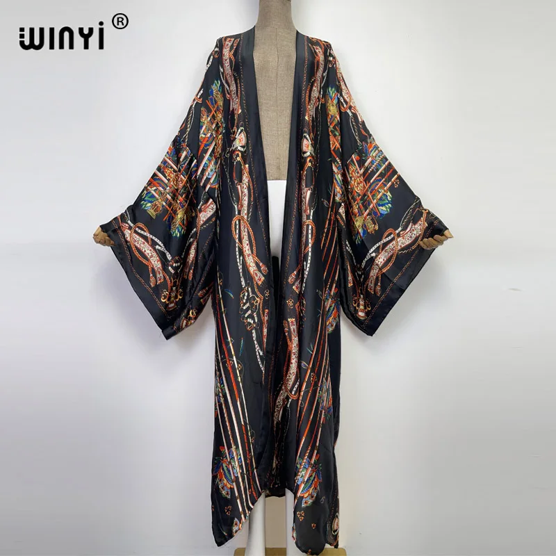 WINYI nowe błyszczące modne drukowanie słodka dama plaża czeski długi kardigan Cover-up stitch Casual Boho Maxi przyjęcie świąteczne kimono