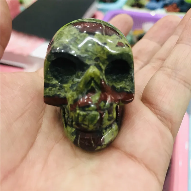 Dragon's blood crystal skull quartz crystal carving natural Reiki skull jewelry statue decoration