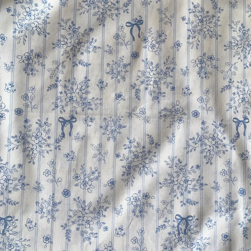 نسيج القطن الأزرق الأزهار القوس بيجامة فستان قمصان ملاءات السرير حقيبة DIY النسيج