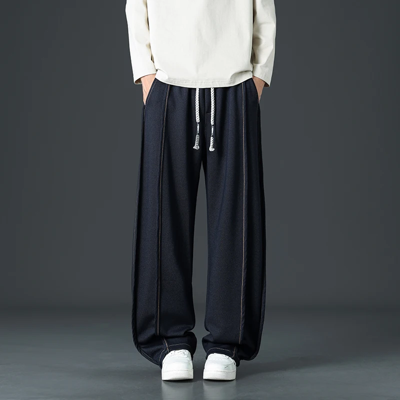 الرجال ربيع الخريف البضائع السراويل الرجال واسعة الساق عموم Tjeans عادية في سن المراهقة الرجال فضفاض مستقيم الساق السراويل العصرية العلامة التجارية واسعة الساق السراويل