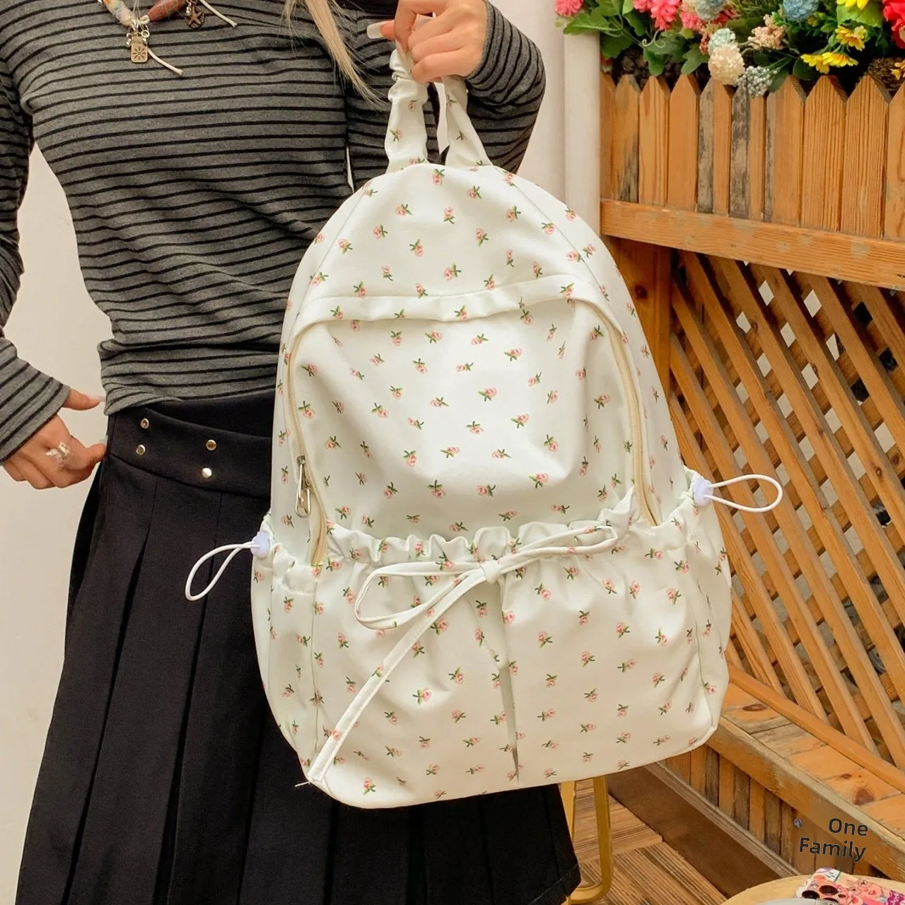 大学生女性用花柄バックパック軽量トラベルショルダーバッグ芸術的なフレッシュスタイルダブルストラップバッグファッショナブルなラップトップバッグ