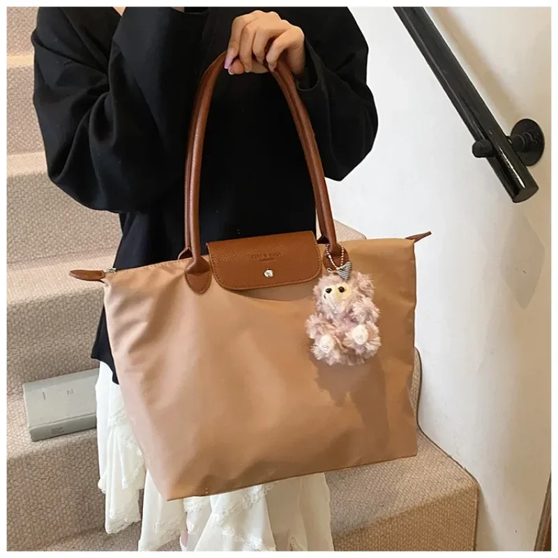 

Fashionable Leather Handbag With Spacious Interior For Elegant Ladies By Famous Designer, Luxury Brand