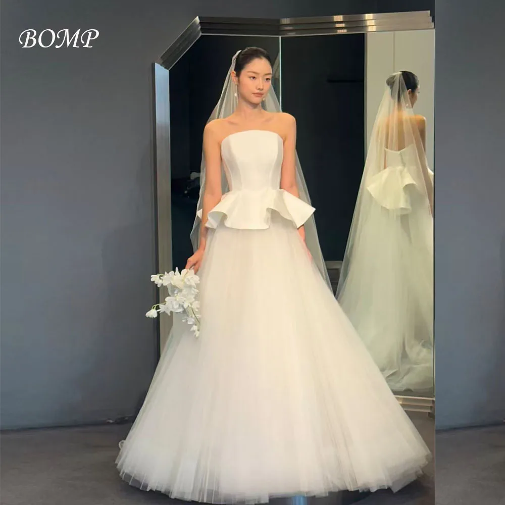 ชุดแต่งงานหรูหราแบบเกาะอกทรงคอร์เซ็ทผ้าทูลล์สีไอวอรี่ยาวกรอมพื้นสไตล์เกาหลีสำหรับถ่ายภาพงานแต่งงานและงานเลี้ยงต้อนรับ  รับตัดตามแบบ