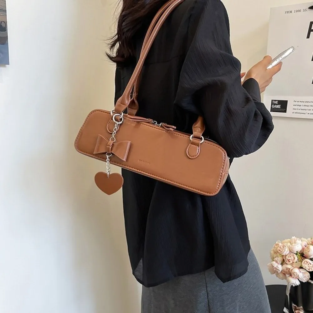 

Элегантная французская сумка с подвеской в виде сердца, большая вместительная милая сумка подмышками, однотонная текстурированная сумка на плечо под мышками, повседневная